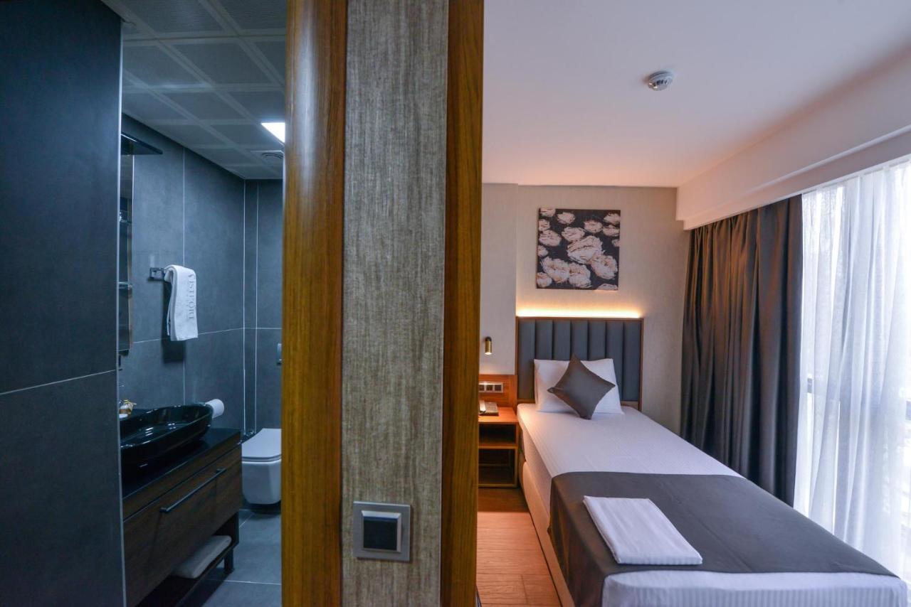 Istport Garden Hotels Arnavutkoy Экстерьер фото A room at the hotel
